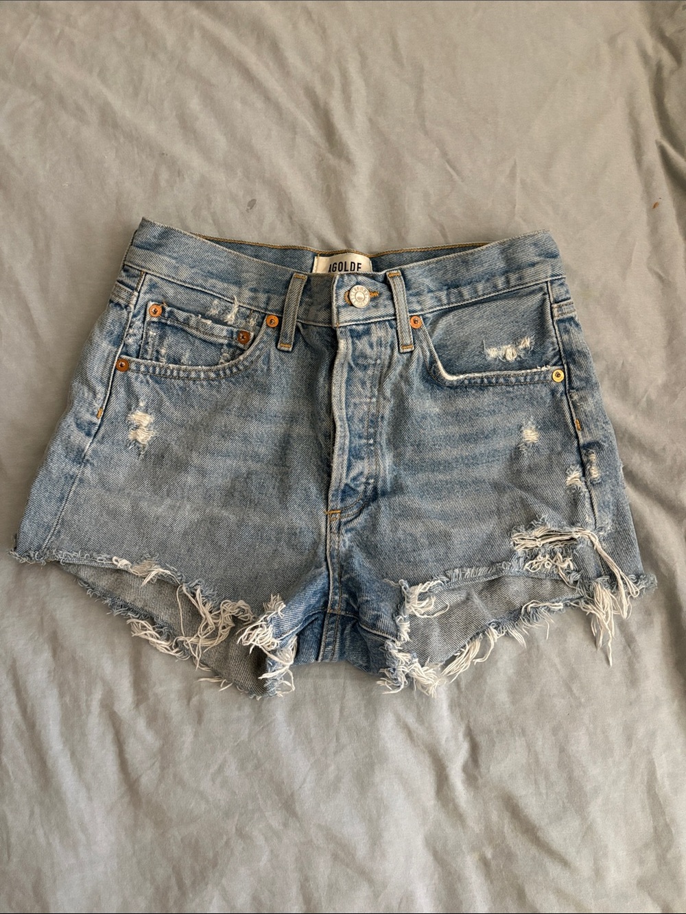 Agolde Light Wash Distressed Denim Cutoff Shorts